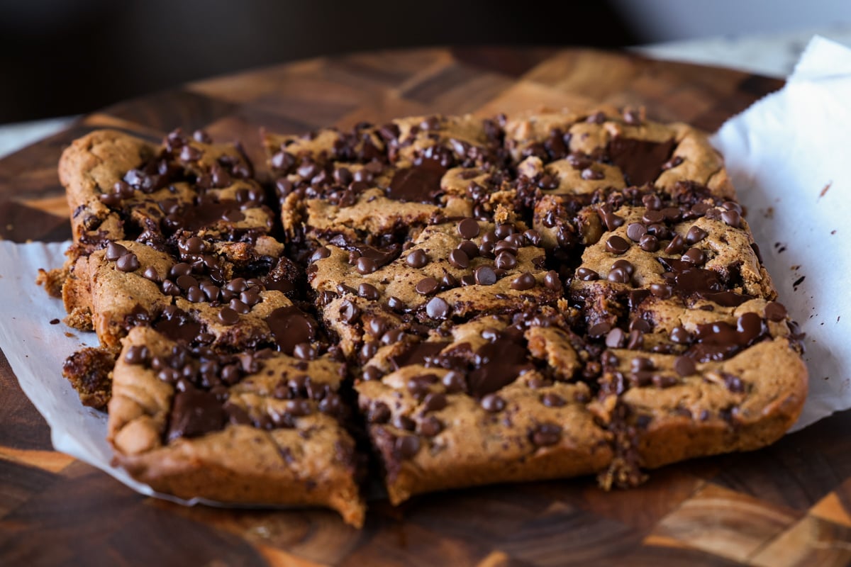 almond butter blondies on a cutting board after slicing