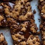 overhead shot of almond butter blondies on a cutting board after slicing