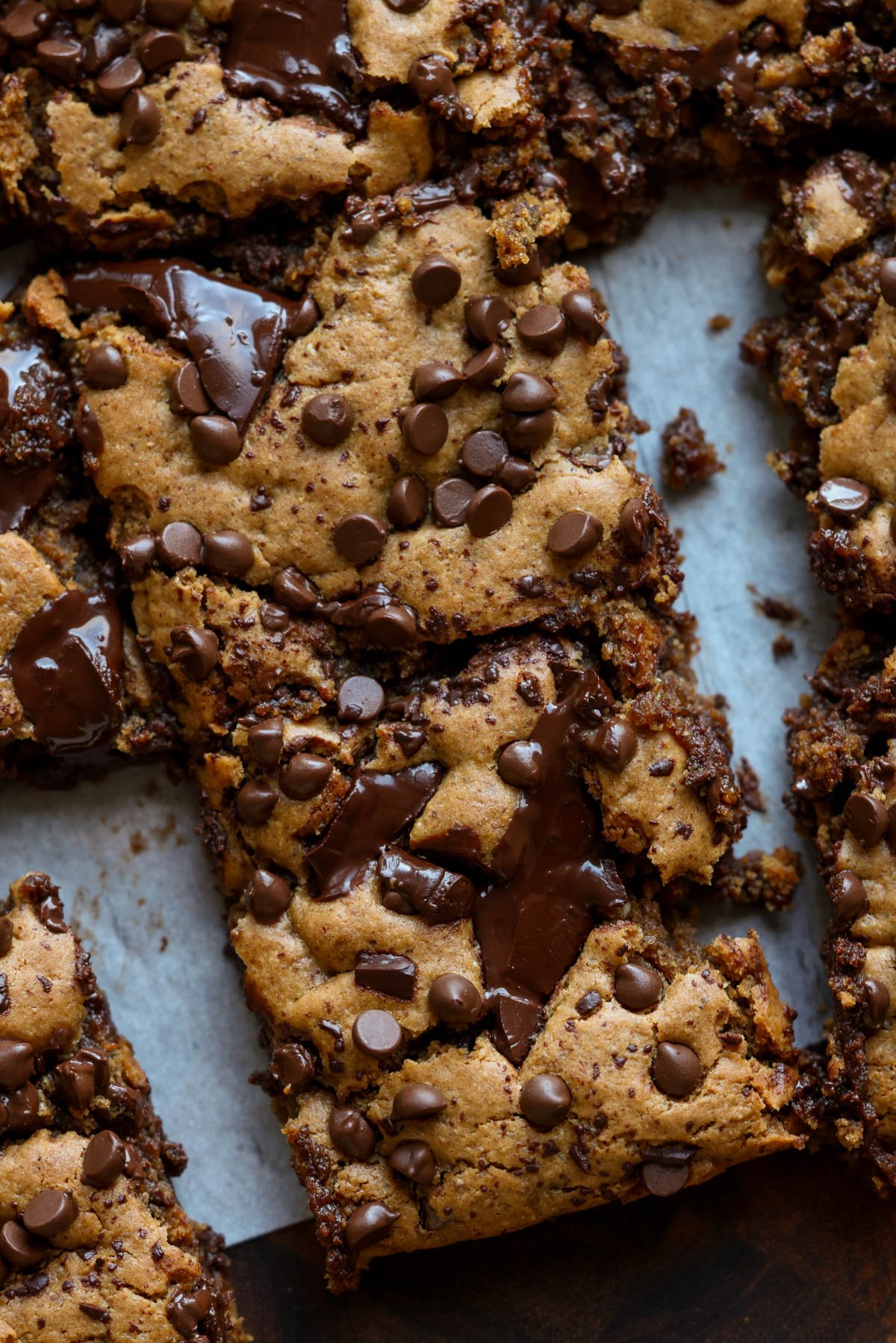 overhead shot of almond butter blondies on a cutting board after slicing