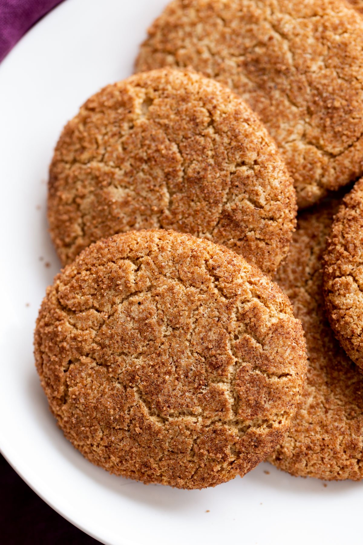 a platter with vegan glutenfree almond flour snickerdoodle cookies