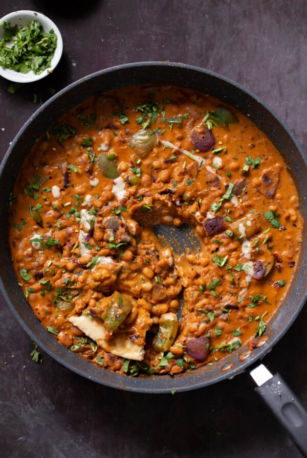 vegan chicken do pyaza in the pan after cooking and dipping toast