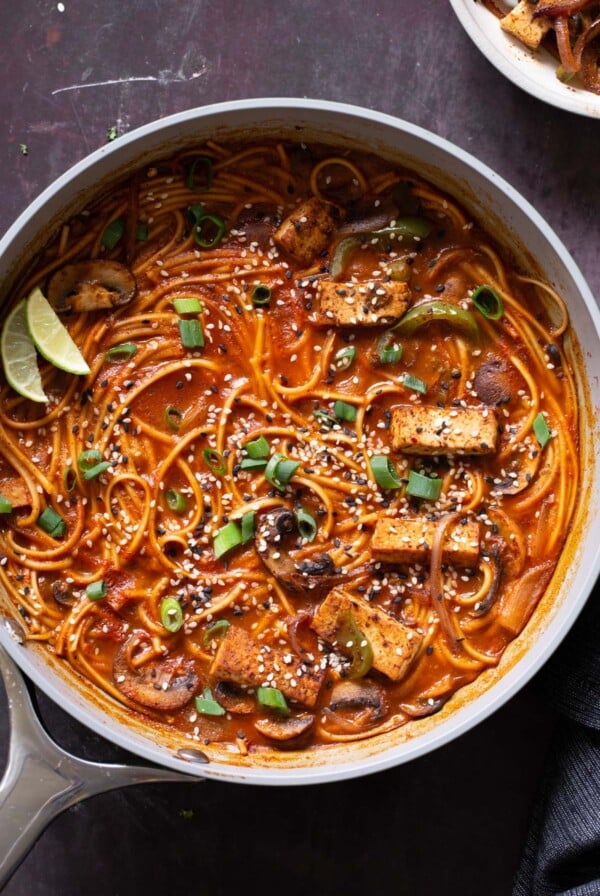 birria ramen in the pan after adding garnishes