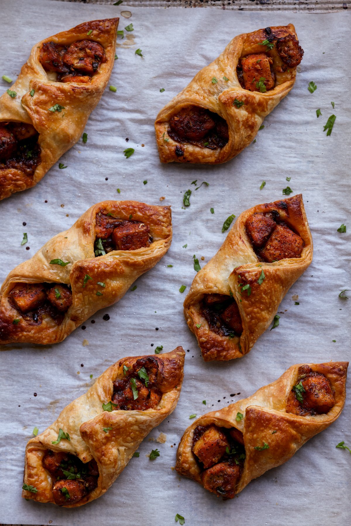 chilli garlic tofu puff pastries on the baking sheet