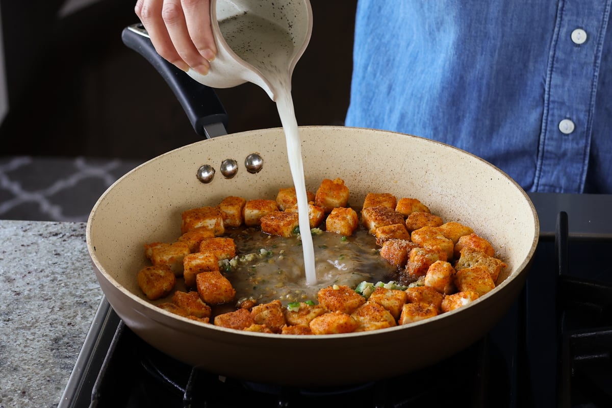 adding cornstarch slurry to the pan