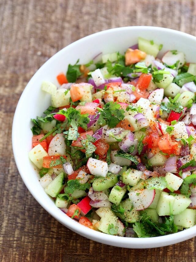 Kachumber Salad - Cucumber Tomato Onion Salad Recipe. Kachumbar is a simple chopped Summer Salad with chopped onions, tomatoes, cucumbers and a salt pepper lemon dressing. Serve as a side with Indian curries, or as a dip with chips, or over burgers. Vegan Gluten-free Soy-free Oil-free Recipe | VeganRicha.com