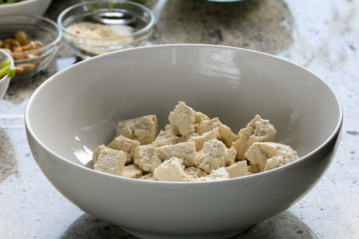 pieces of tofu in a mixing bowl