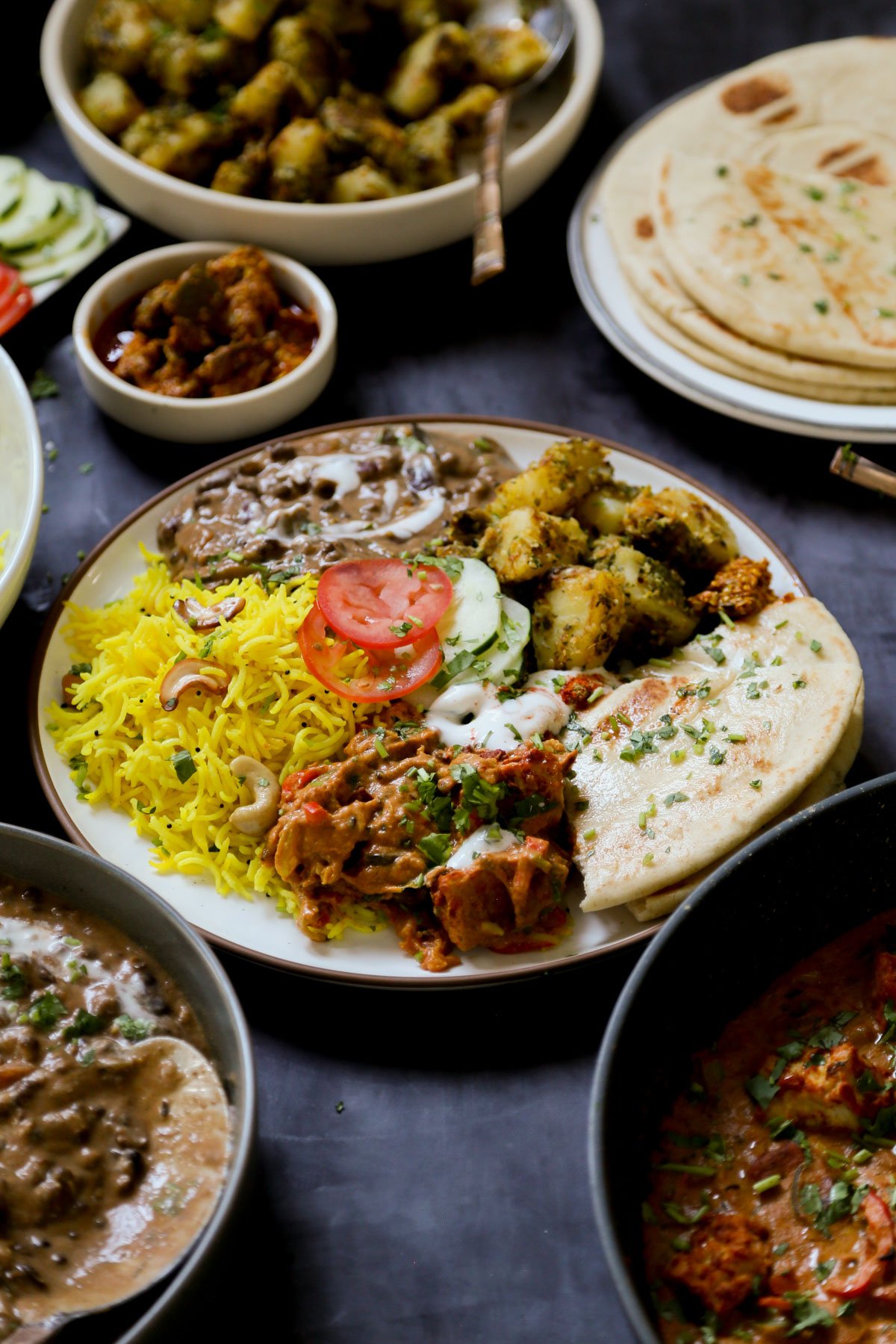 plate of no onion no garlic Diwali food surrounded by serving bowls