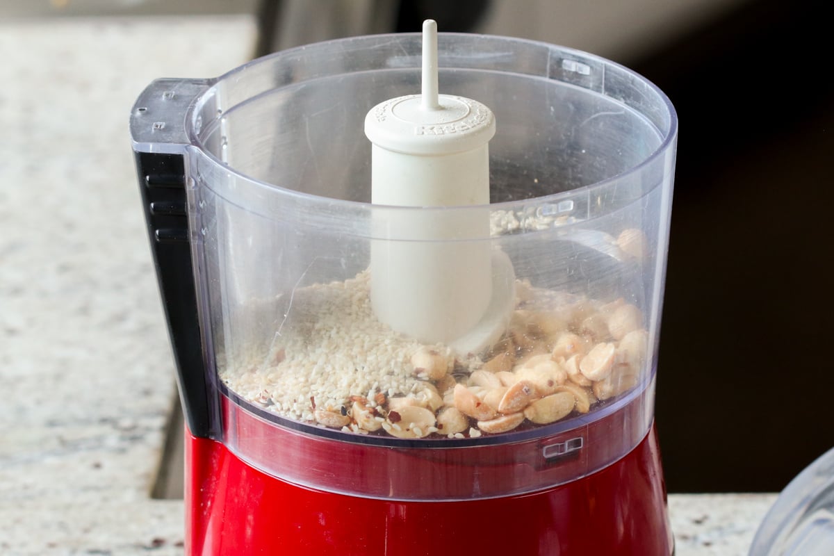 peanuts and sesame seeds in the food processor