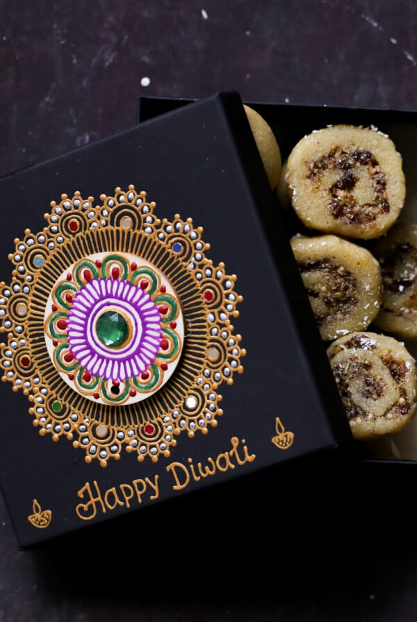 gujiya peda in a Diwali gift box that's half closed