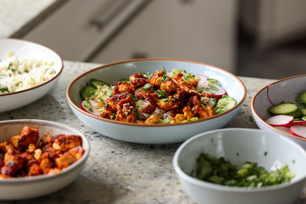 harissa tofu bowl on the kitchen counter