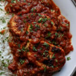 peri peri chicken on a plate with rice