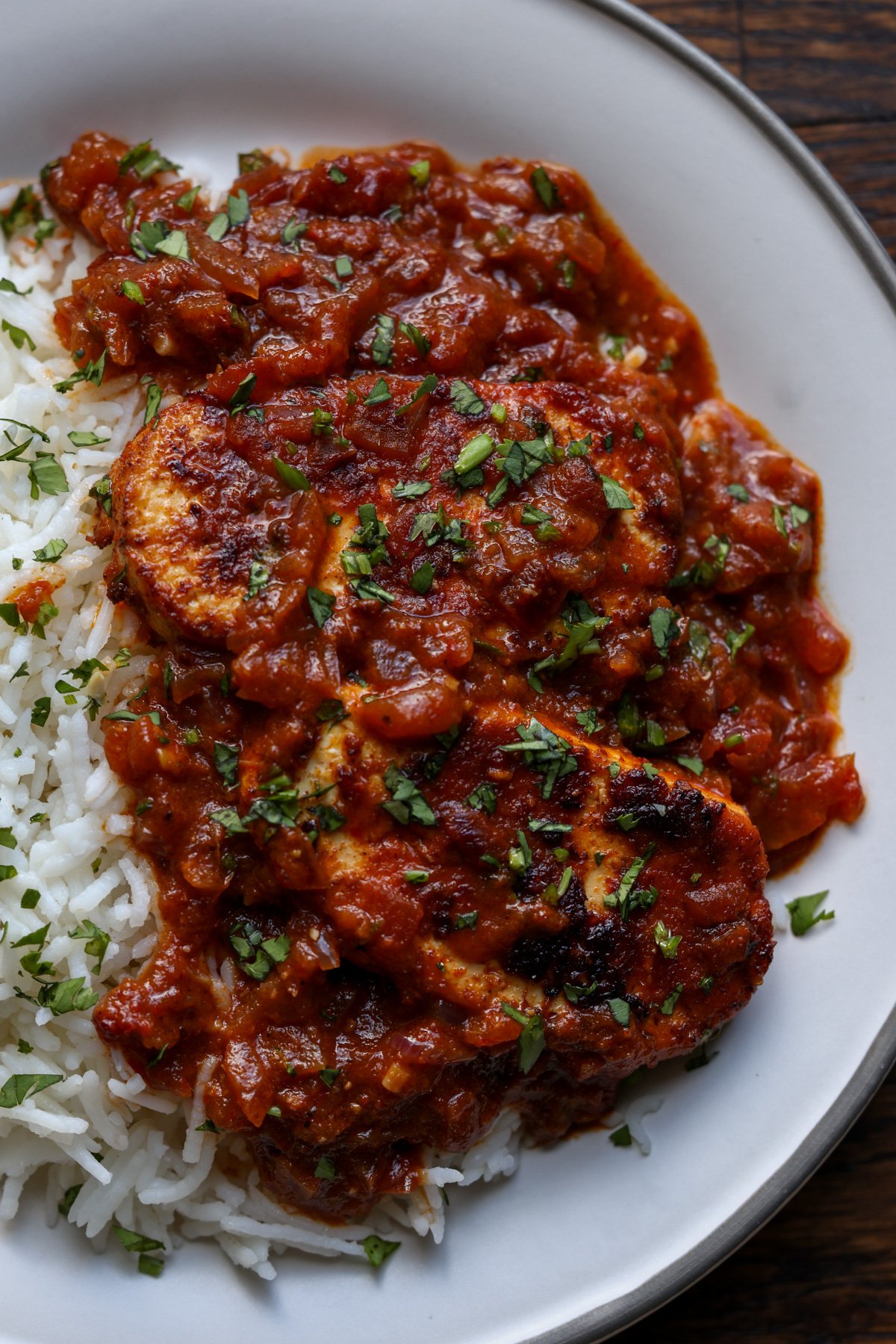 peri peri chicken on a plate with rice