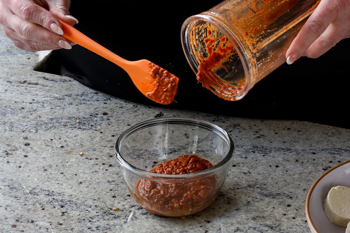 transferring blended Goan peri peri sauce to a bowl