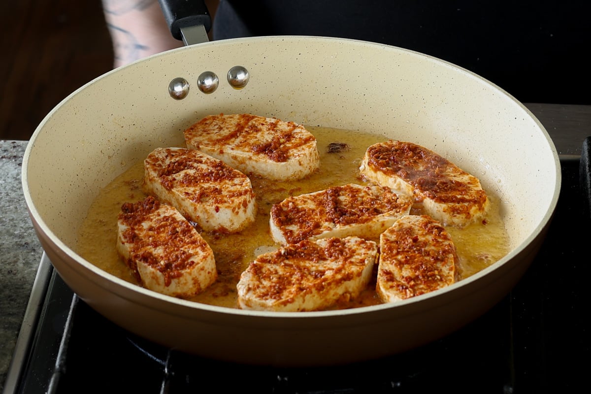 tofu filets cooking in the pan