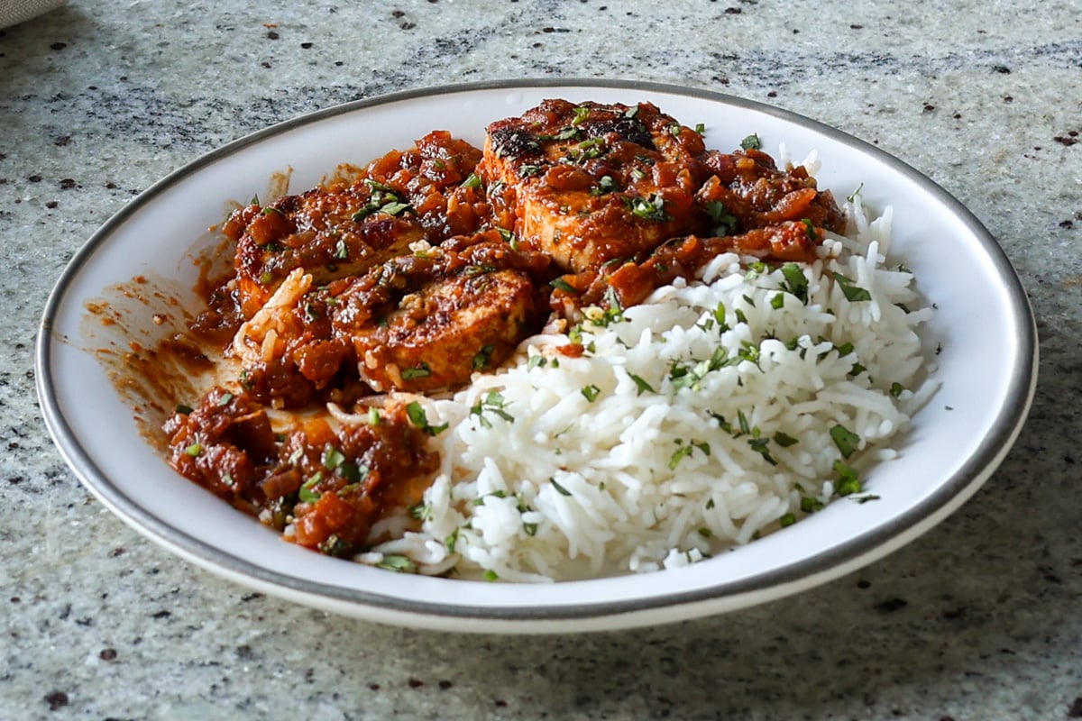 plate of peri peri chicken with rice