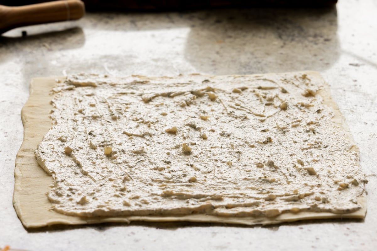 jalapeño popper dip after spreading out onto the puff pastry