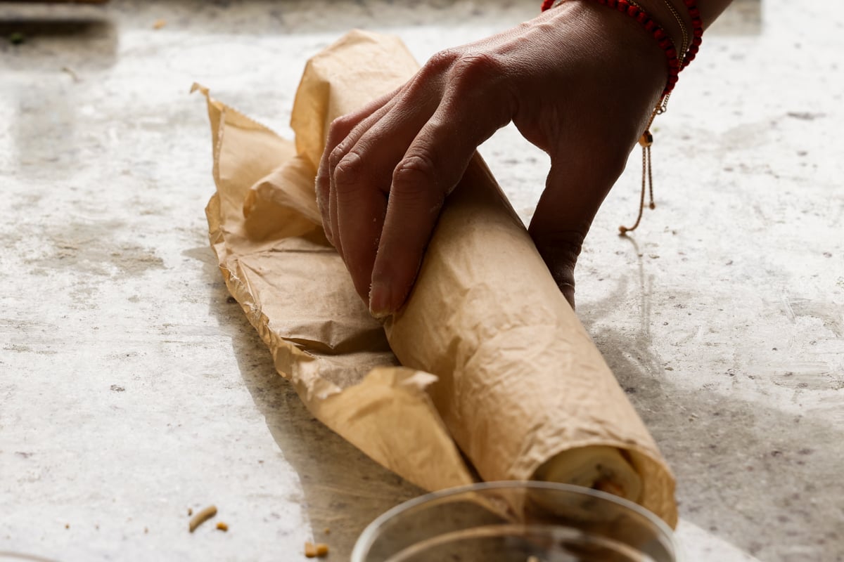 wrapping jalapeño popper pinwheels in parchment paper