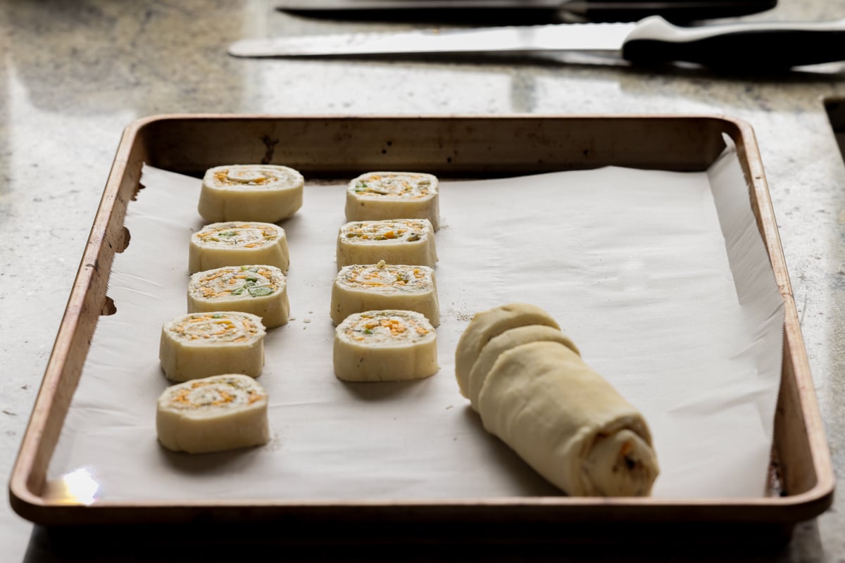 chilled jalapeño popper pinwheels during slicing