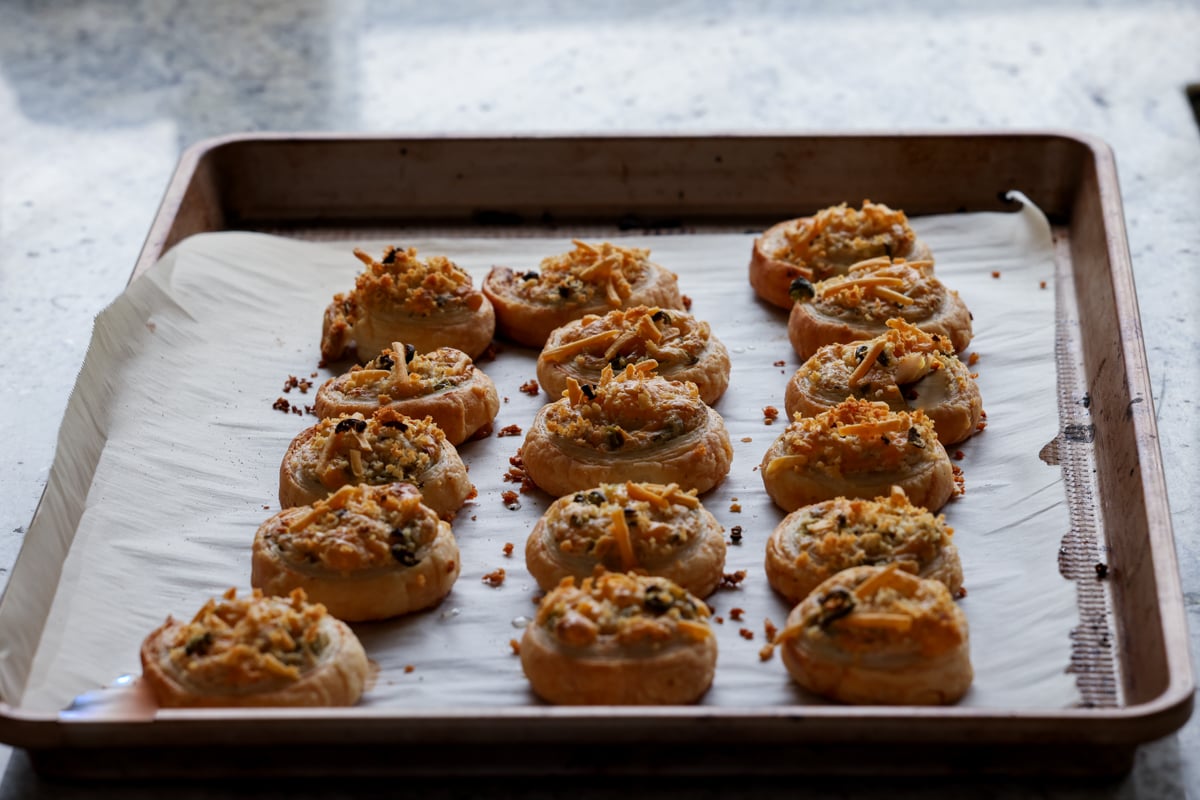 jalapeño popper pinwheels on the baking sheet after baking