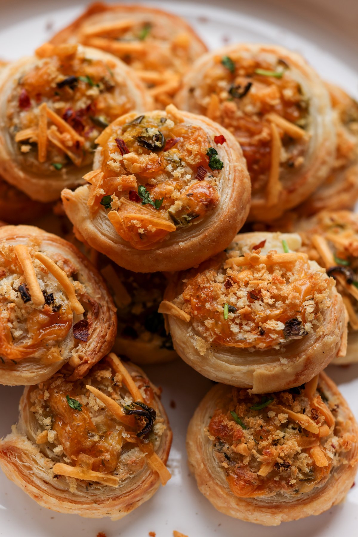 close-up of jalapeño popper pinwheels on a serving platter