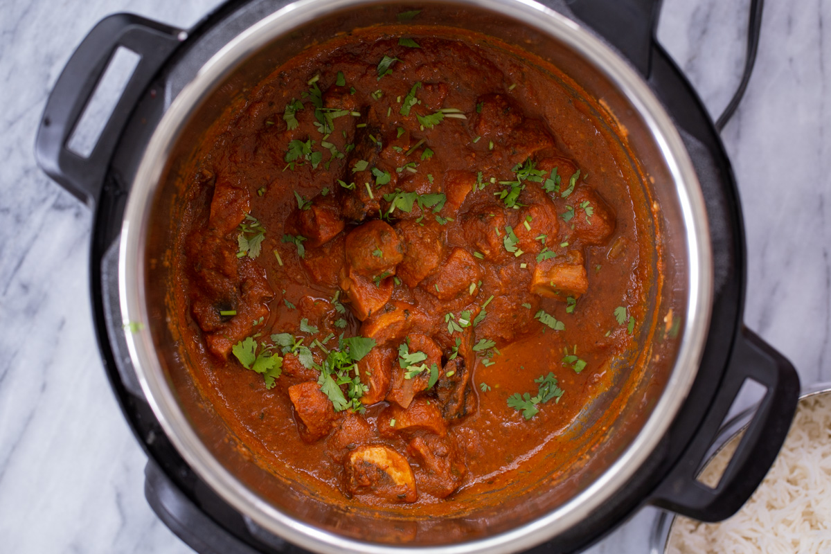 Kashmiri mushrooms in the Instant Pot, garnished with cilantro