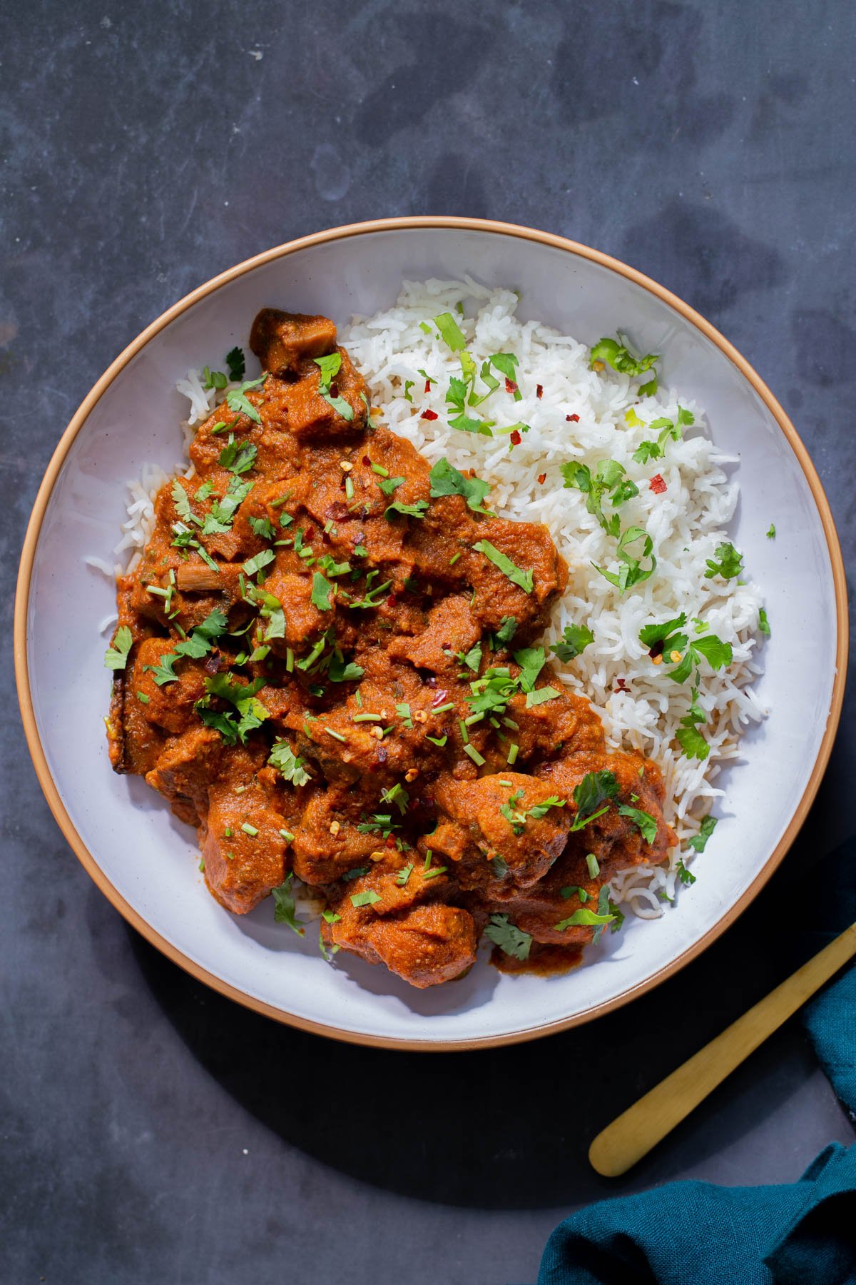 bowl of Kashmiri mushrooms, garnished with cilantro