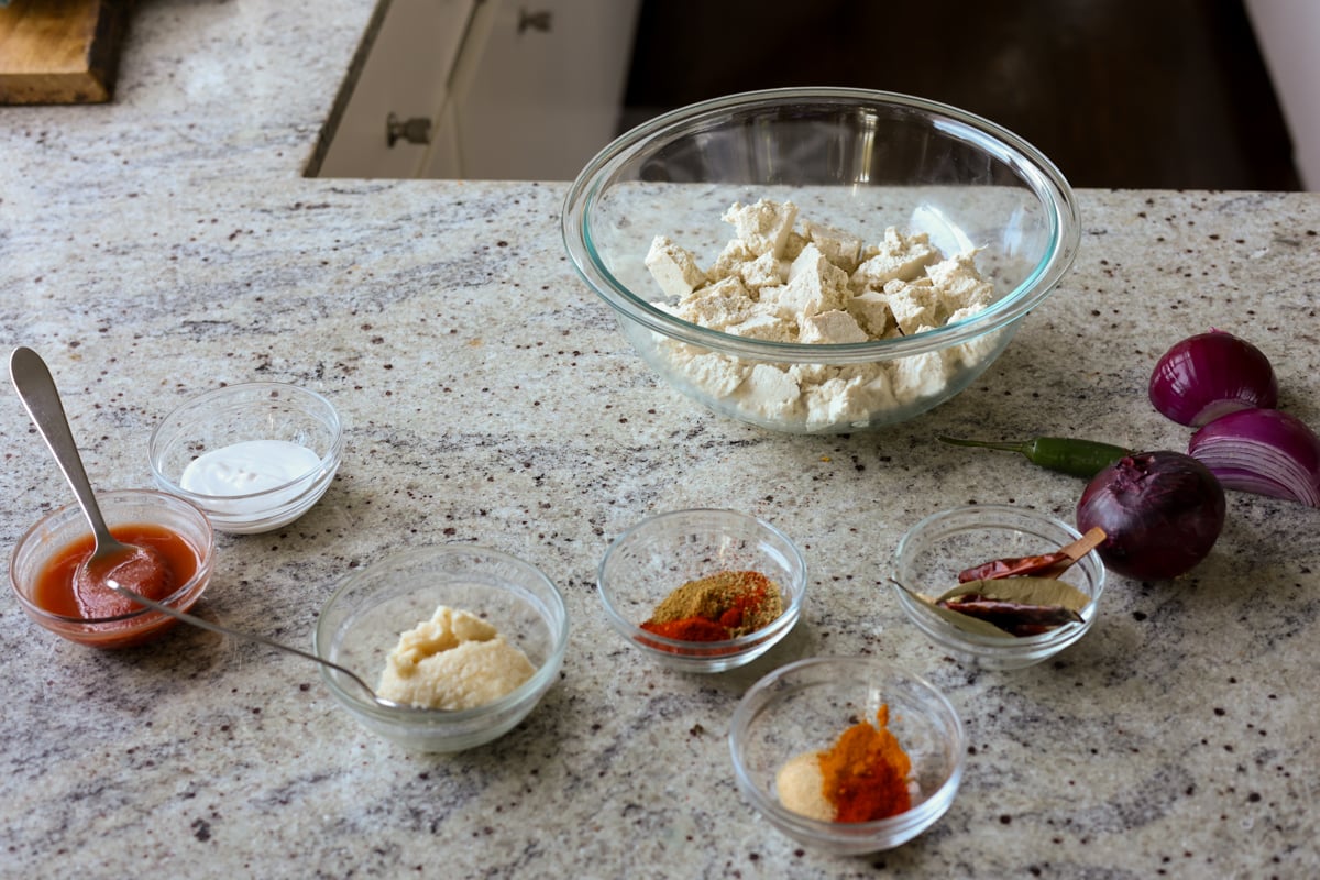 kosha mangsho ingredients in bowls