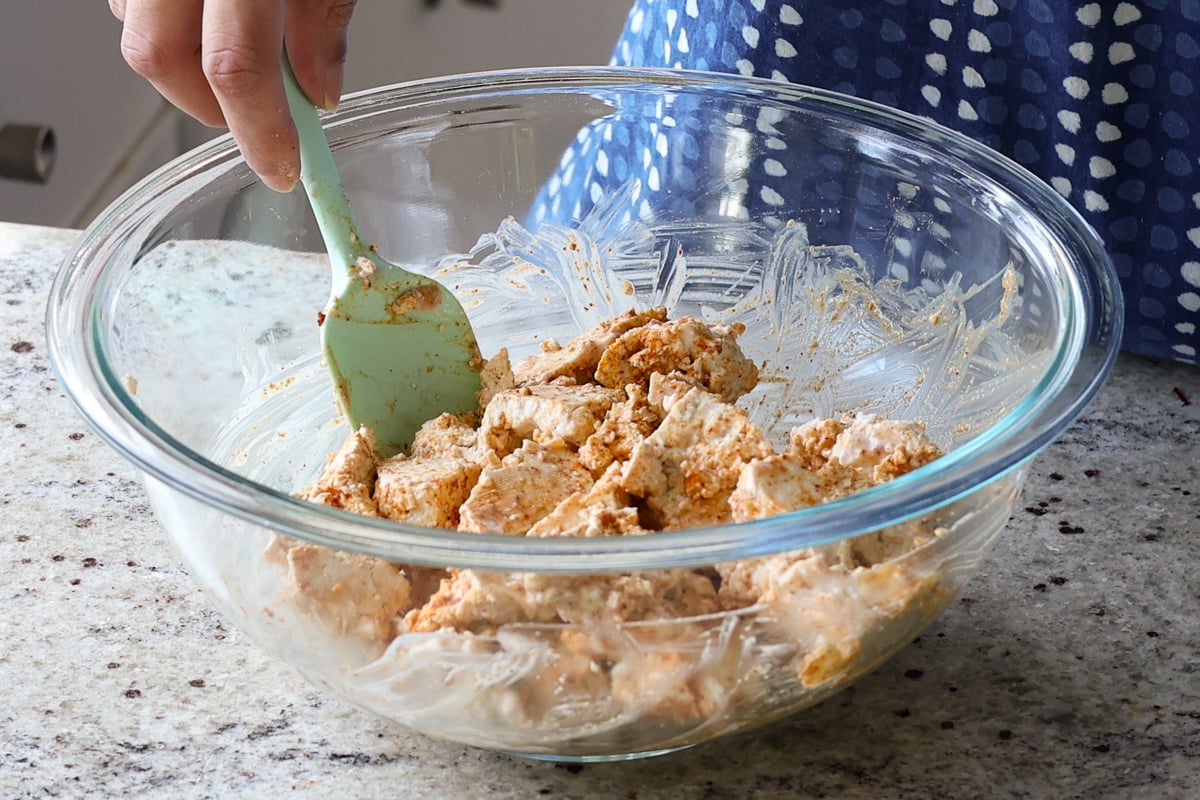 mixing the tofu and spices