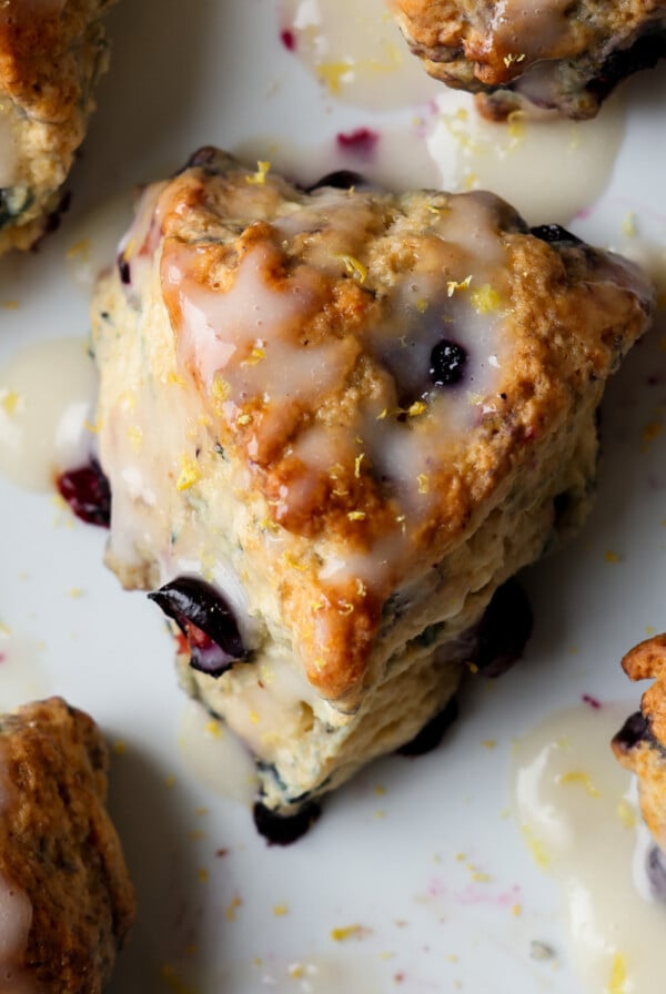 lemon blueberry scones on the serving tray, after glazing