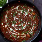 lentils vindaloo in the pan after adding the toppings