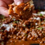 scooping up some lentils vindaloo with naan