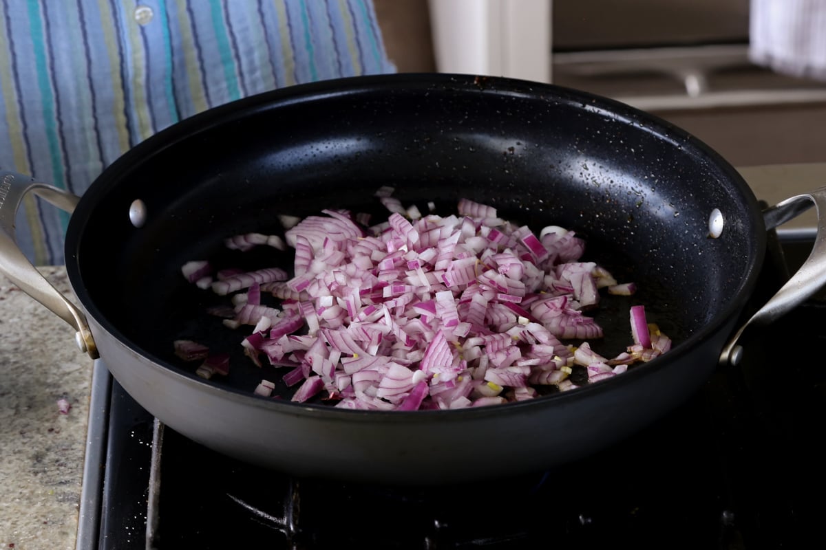 onions in the pan before cooking