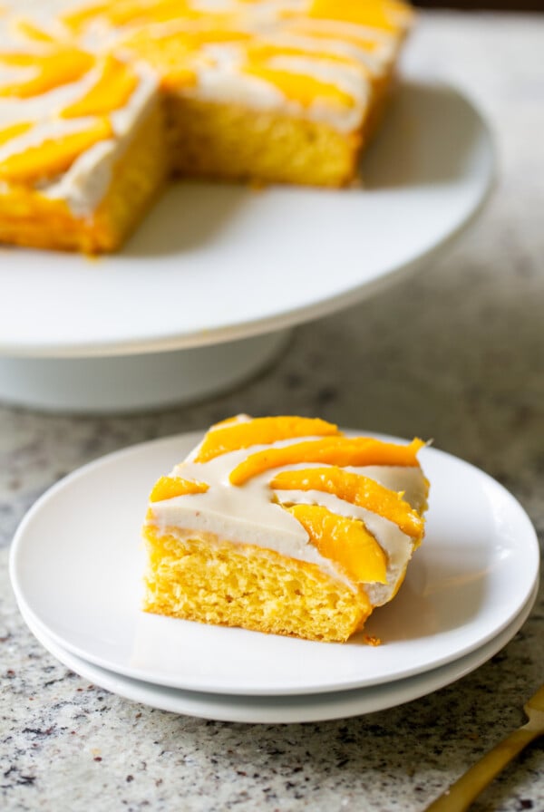 slice of mango tiramisu on a white plate