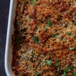 close-up of mushroom parmesan in the pan after baking