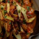 extreme close-up of a bowl of salli boti