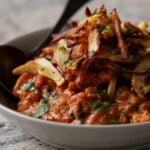 close-up of a bowl of salli boti