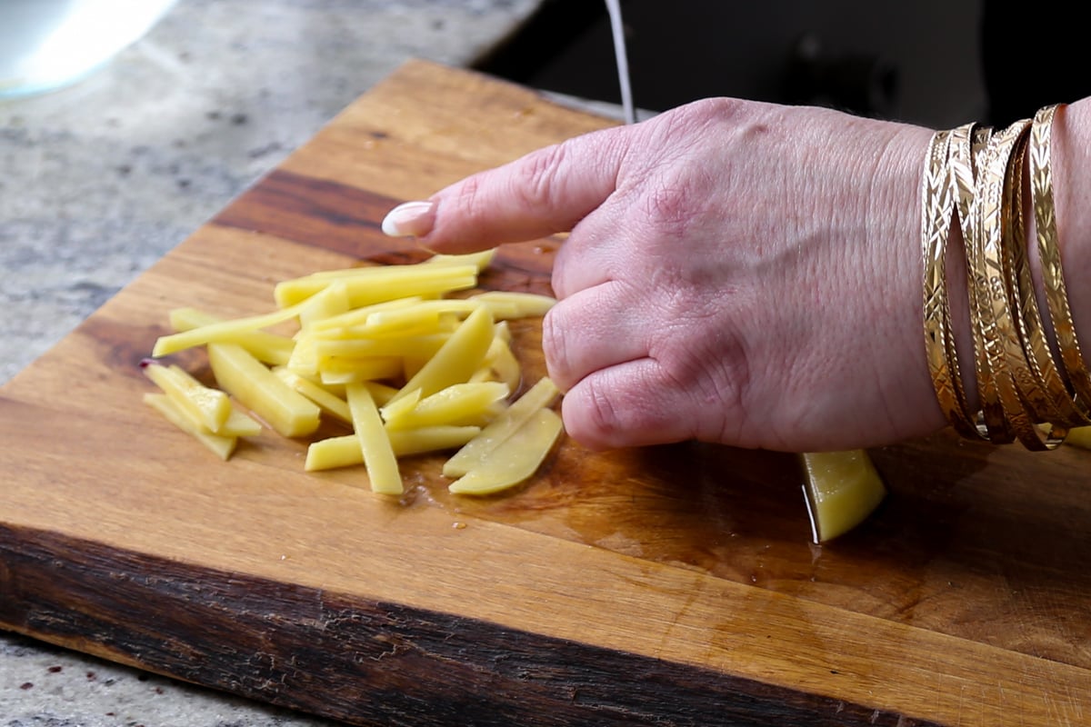 cutting the potatoes