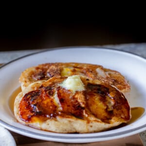 a plate of peach upside-down pancakes