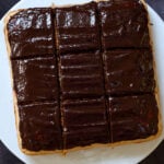 overhead photo of sliced peanut butter sheet cake