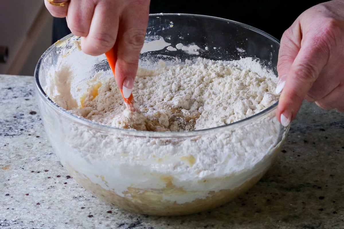 adding the dry ingredients to the wet