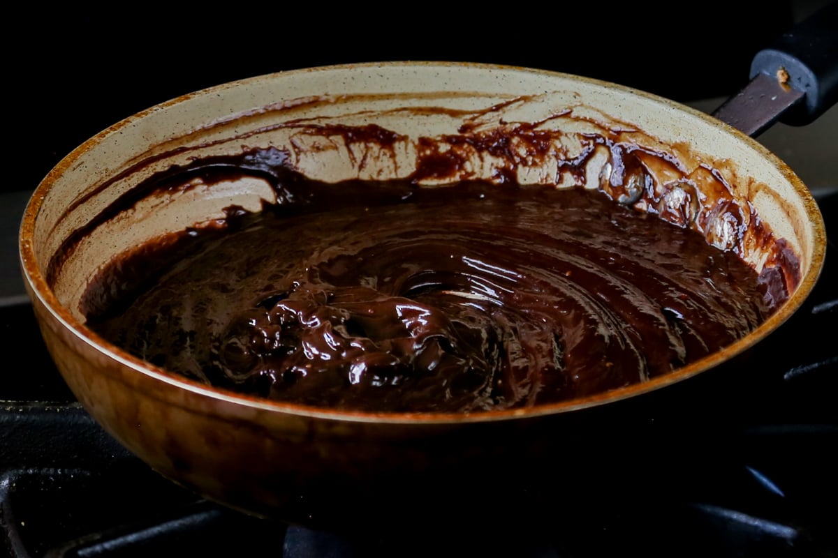 chocolate peanut butter glaze in the pan after melting