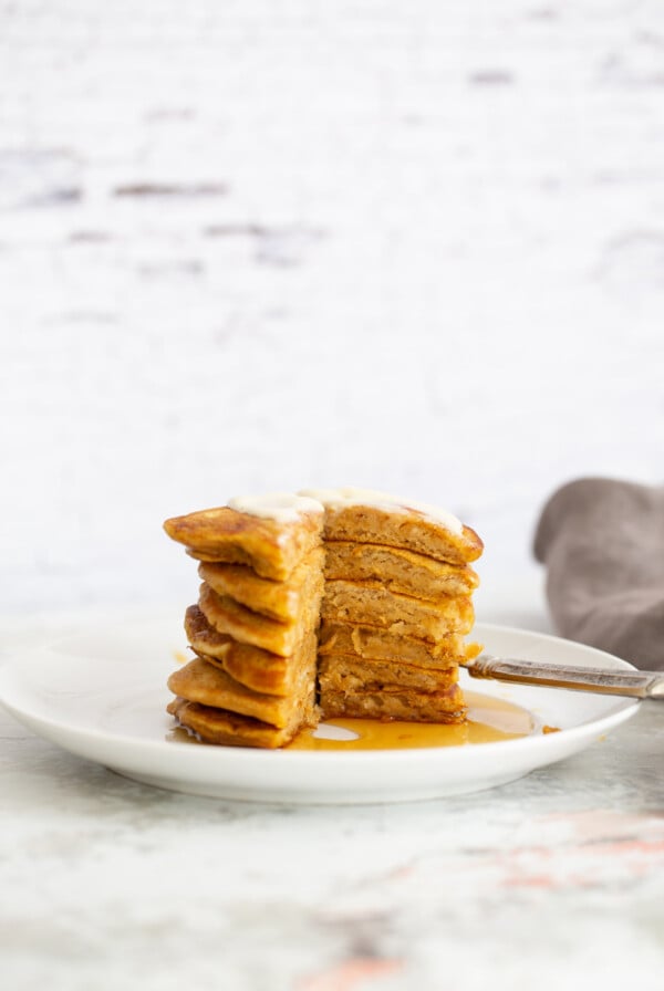 a stack of vegan pumpkin pancakes