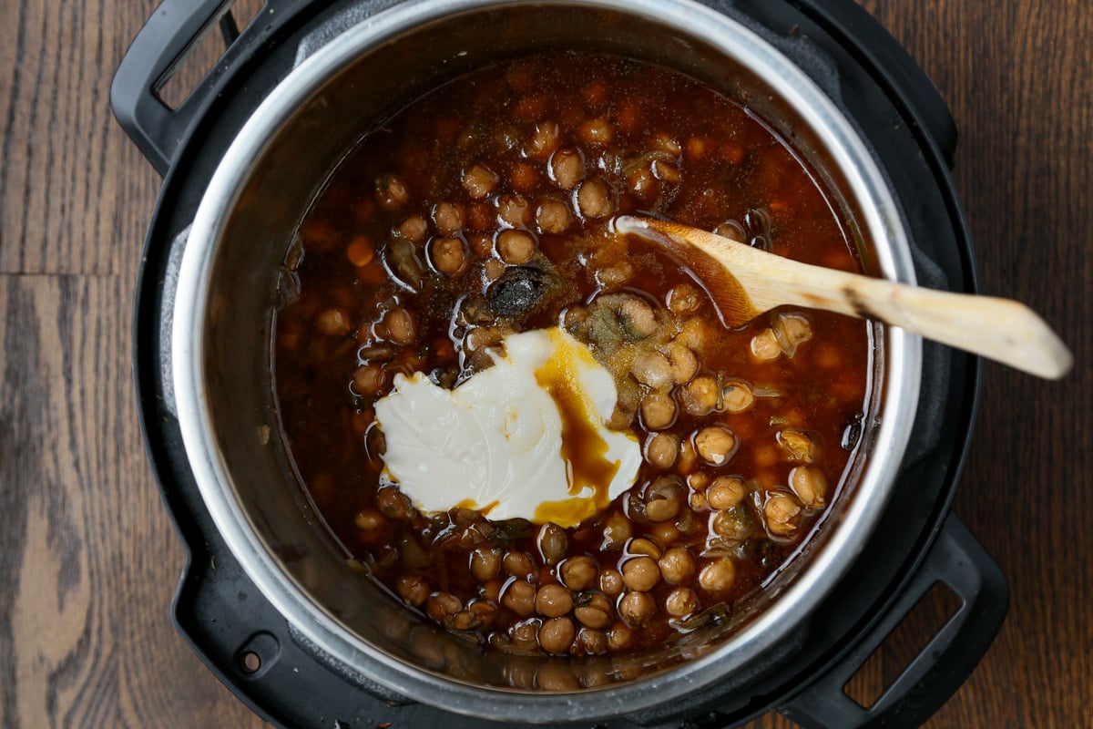 adding nondairy yogurt to Punjabi chole in the Instant Pot