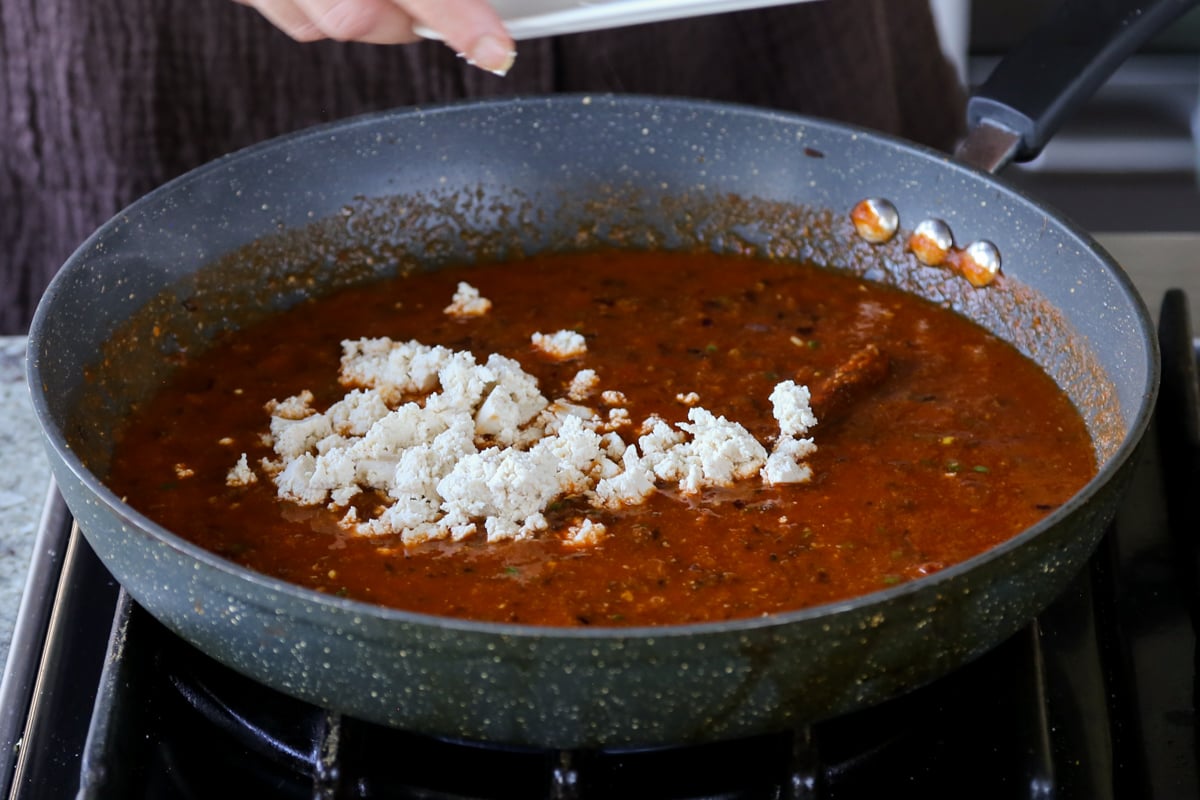 adding crumbled tofu