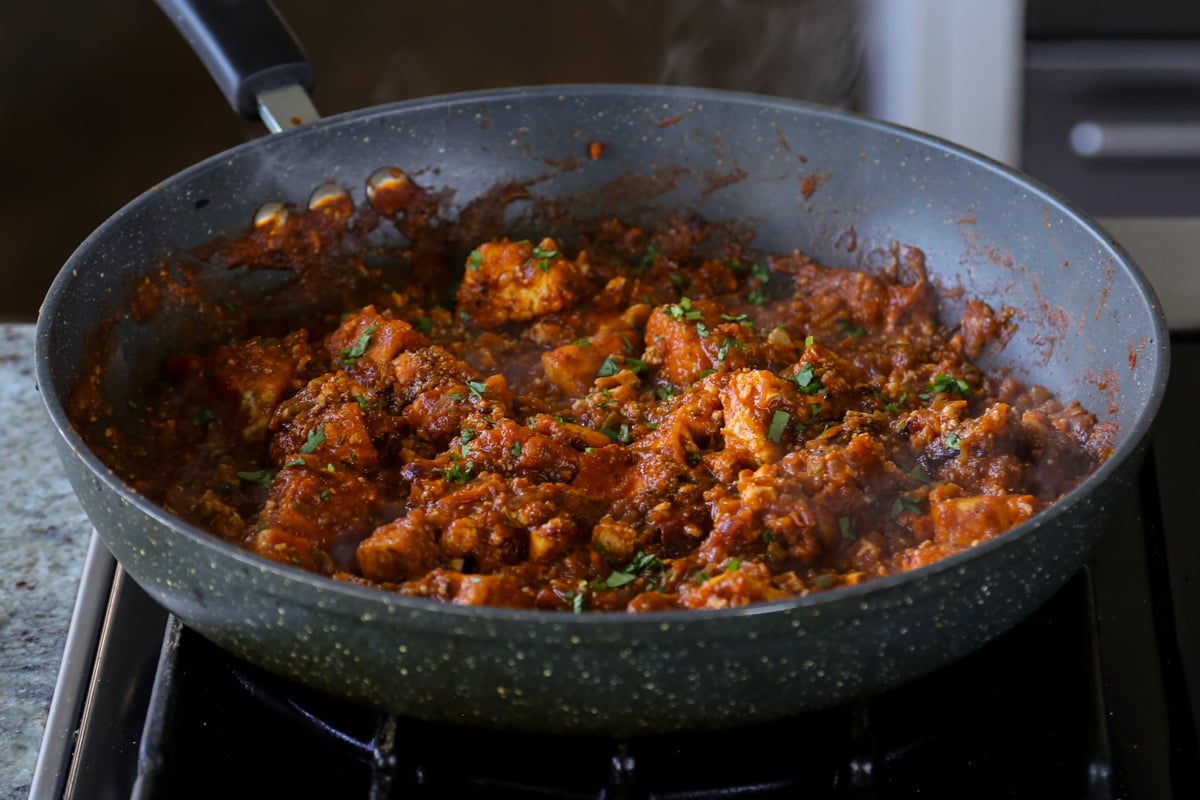 rara chicken curry in the pan after cooking