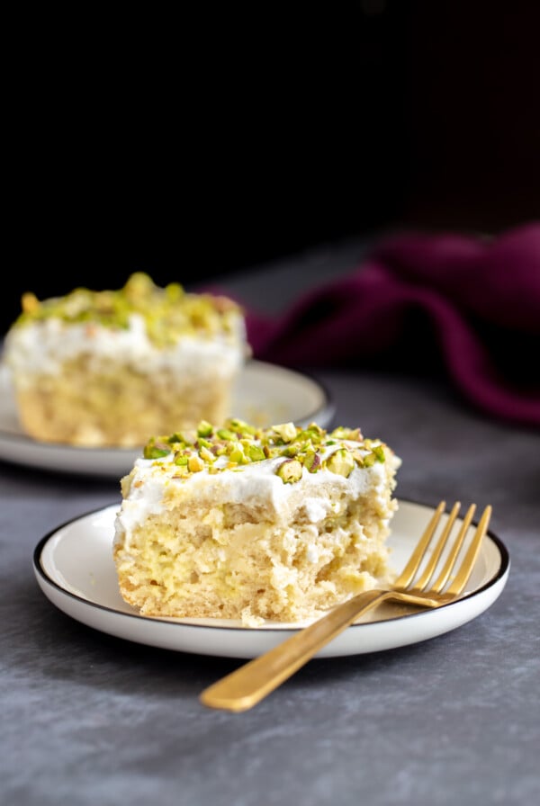 a slice of vegan ras malai tres leches cake