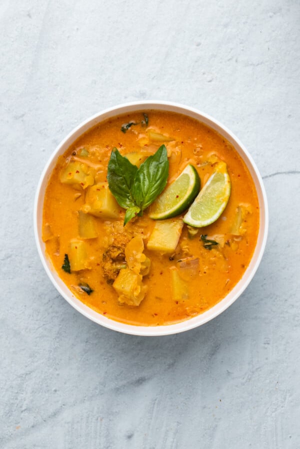 overhead shot of a creamy vegan red lentil sweet potato curry