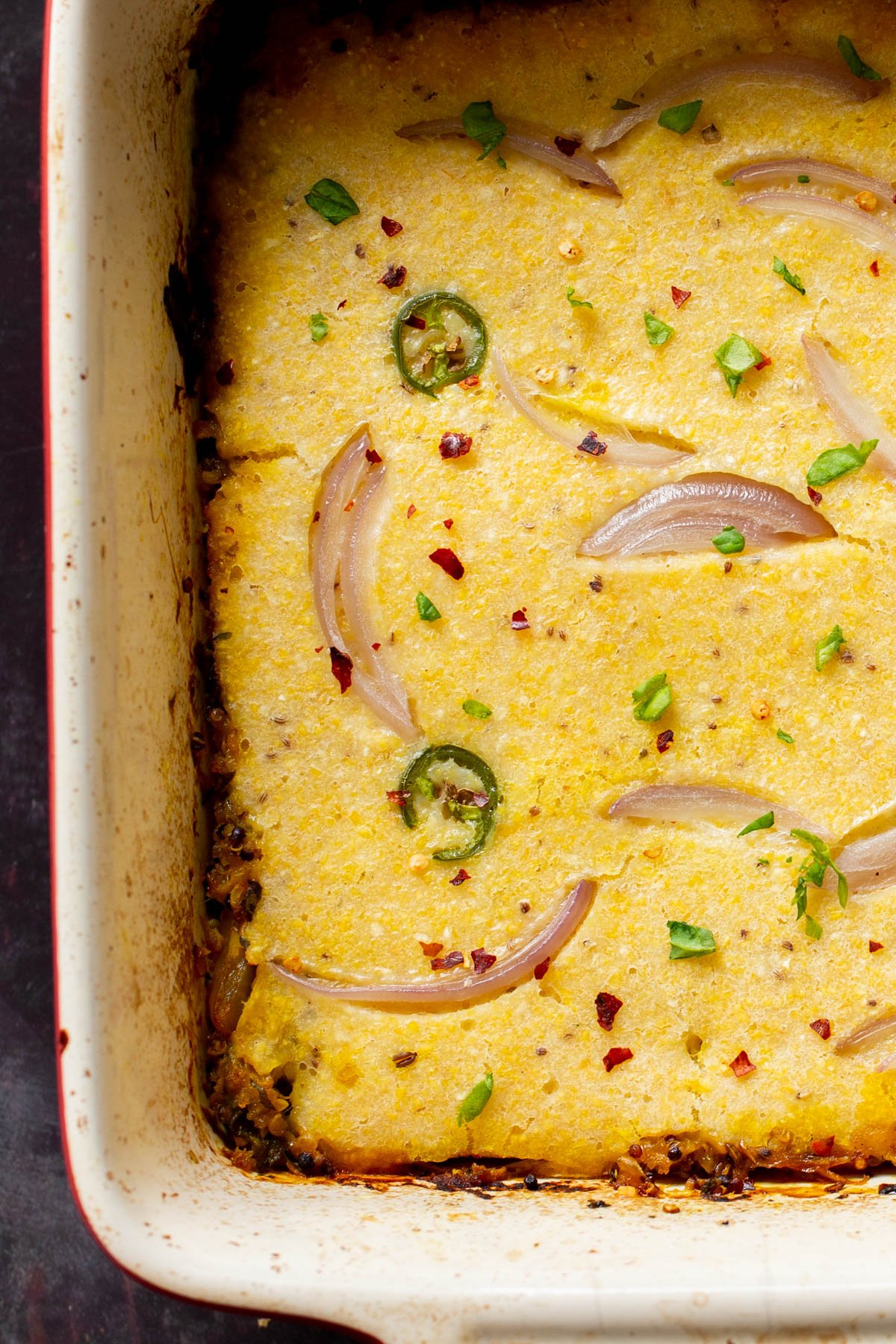 close-up overhead shot of vegan saag cornbread casserole 