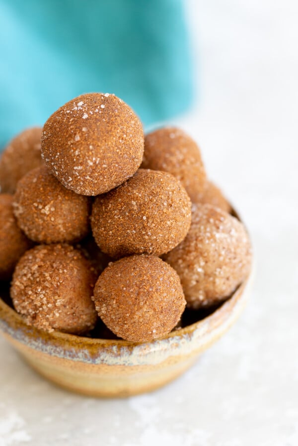 Vegan Snickerdoodle Energy Bites in a small clay bowl