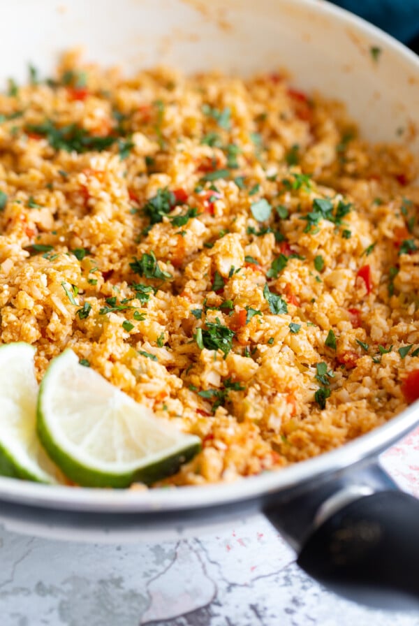 side view of Spanish cauliflower rice in a pan